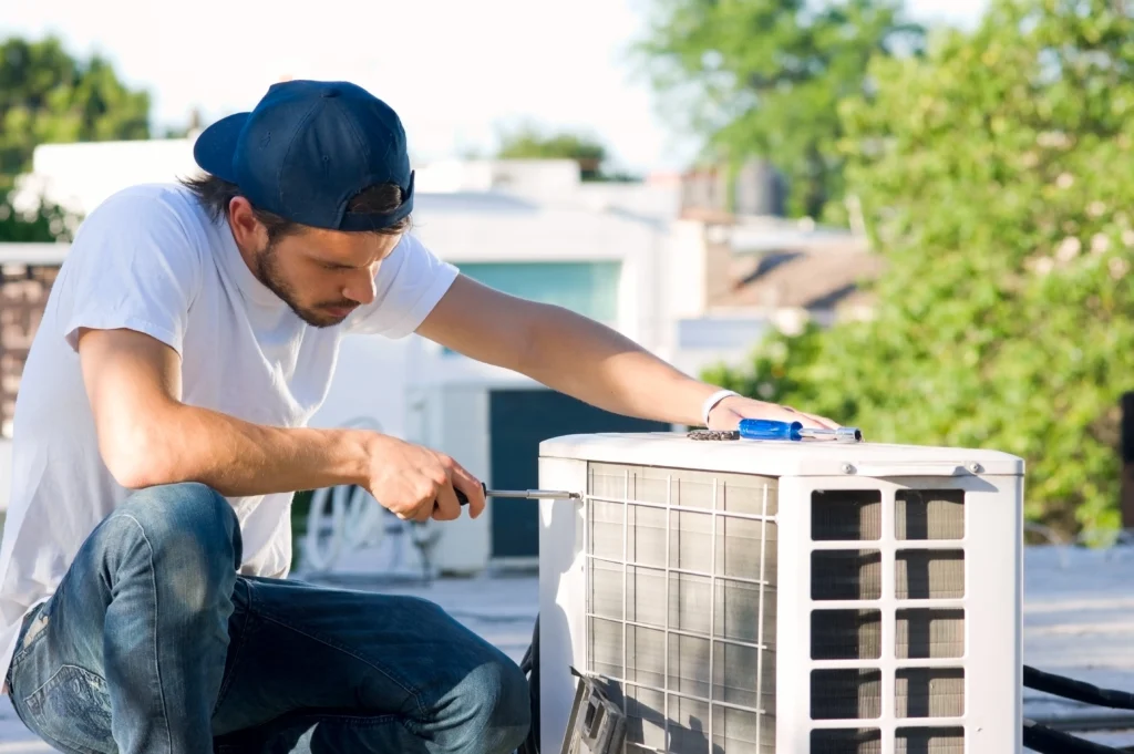 HVAC worker performing Heat Pump Installation in East Hanover, NJ